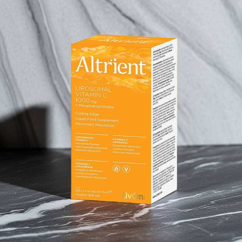 Altrient Liposomal Vitamin C supplement box on a marble surface with a grey background