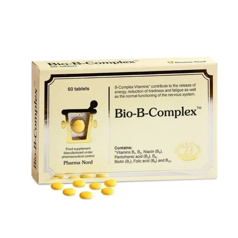 Box of Bio-B-Complex vitamins with scattered tablets on a white background